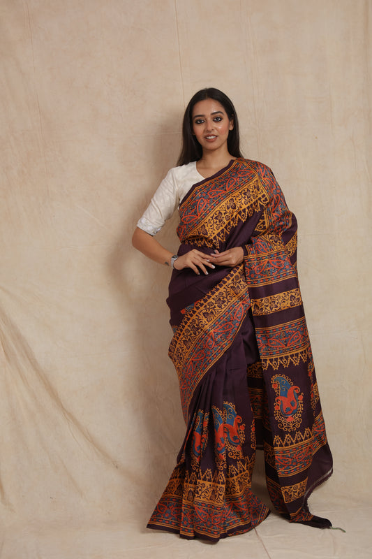Royal aubergine Batik silk saree with multicolour paisley border and pallu