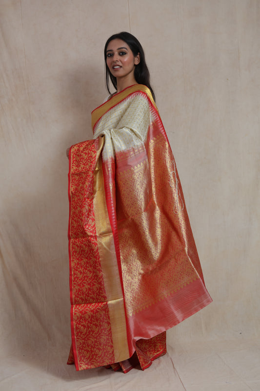 Side profile of ivory Venkatagiri silk saree showcasing rich woven pallu