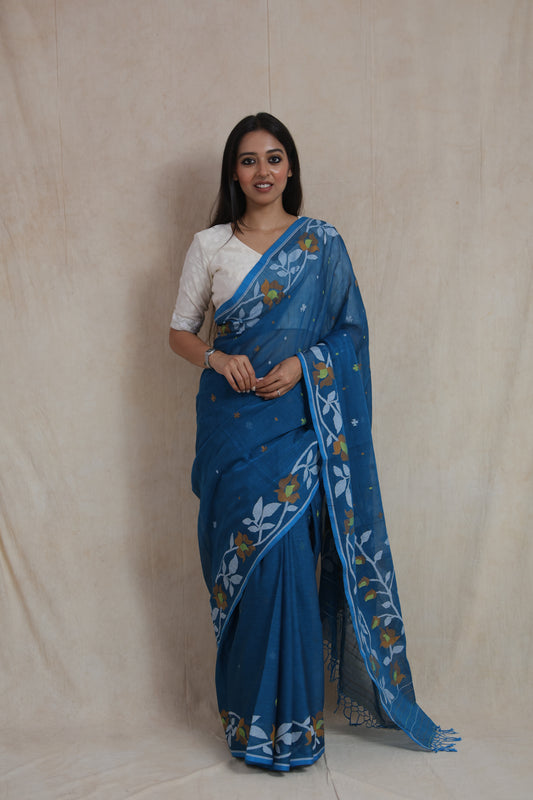 Front view of royal blue Bengal Cotton Fulia saree with floral woven border and delicate motifs
