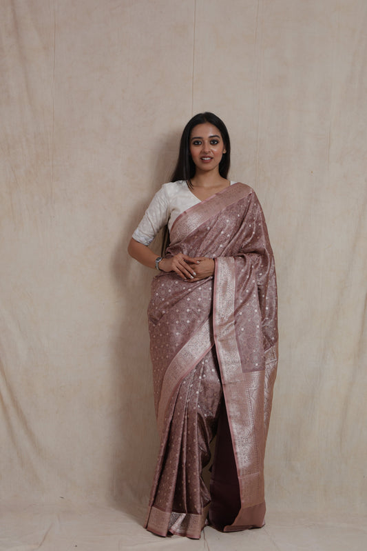 Full view of dusty rose Banarasi art silk saree with woven floral motifs and rich border
