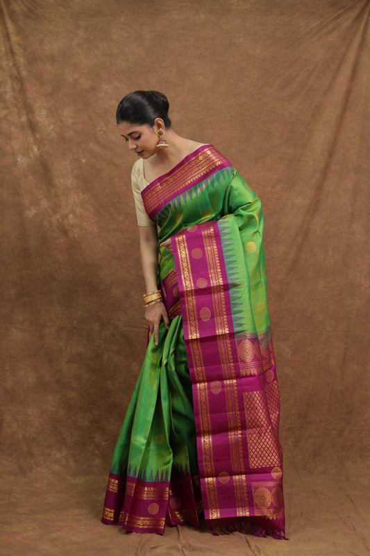 Emerald Green Gadwal Silk Saree with Magenta Border & Rich Gold Woven Pallu