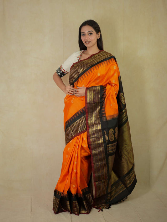 HANDWOVEN ORANGE COLOUR GADWAL SILK SAREE WITH 94 CM BLOUSE PIECE
