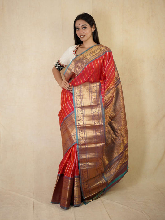 HANDWOVEN REDDISH PINK COLOUR GADWAL SILK SAREE WITH 87 CM BLOUSE PIECE