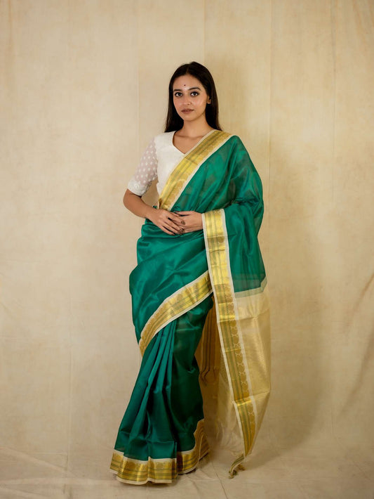 HANDWOVEN BOTTLE GREEN COLOR KANCHIPURAM SILK BY COTTON SAREE WITH 75 CM BLOUSE PIECE