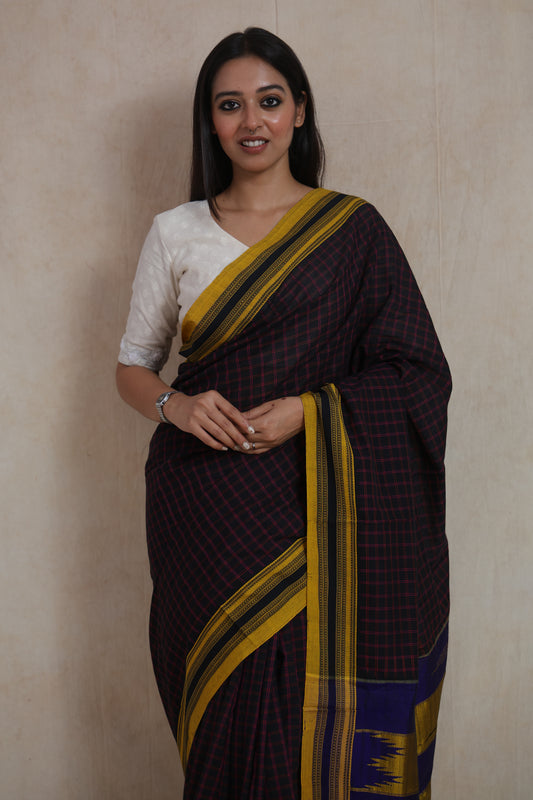 Black checked Ilak cotton saree with mustard border and royal blue woven pallu