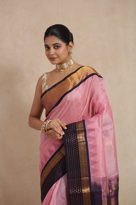 Blush pink Kanchipuram Sico saree with deep purple zari border, traditional Indian silk saree by Joyee Kolkata.