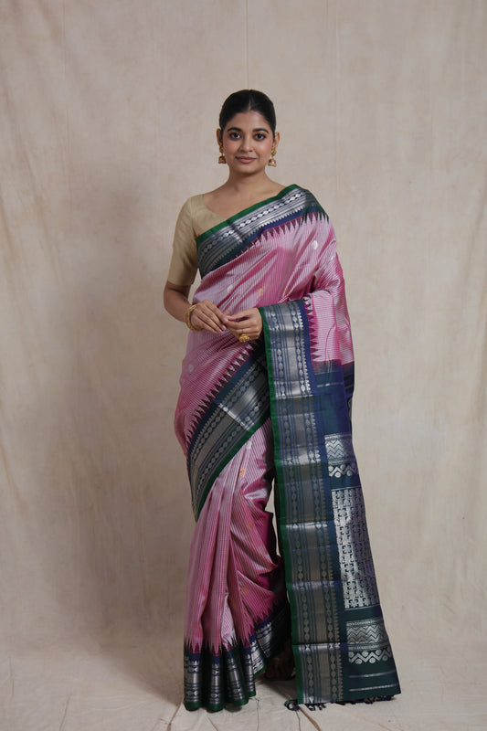 Full front view of blush pink Gadwal Silk saree with rich woven pallu