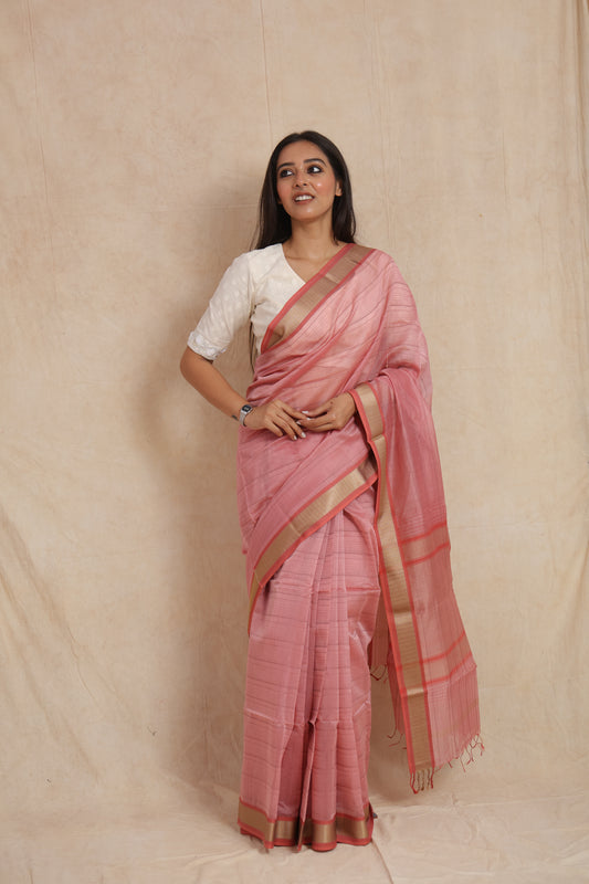 Elegant styling in blush pink Maheshwari cotton saree