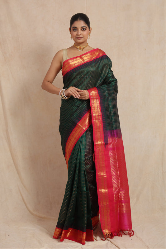 Full drape view of green Kanchipuram Sico saree with zari checks