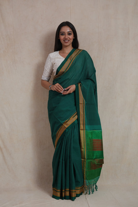 Full front view of traditional emerald green Ilkal cotton saree