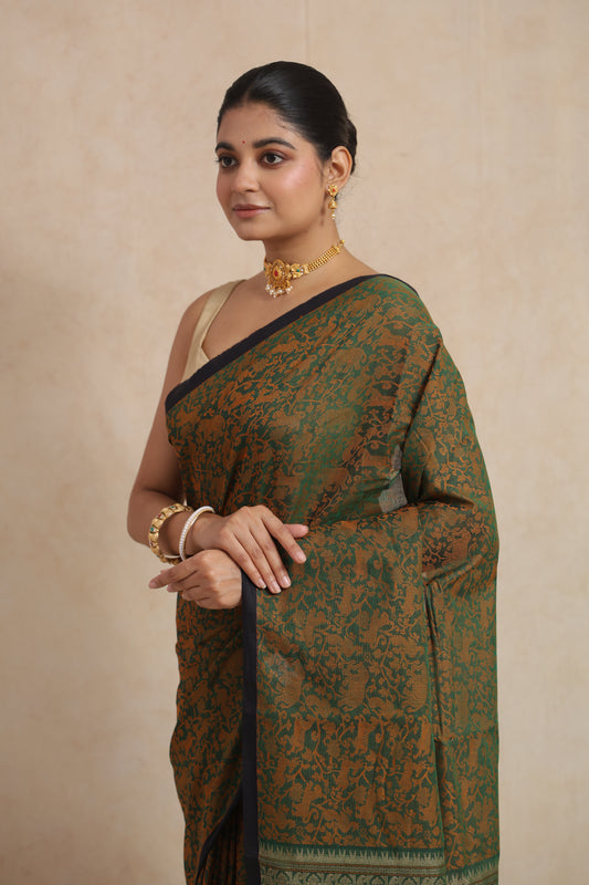 Portrait view of emerald green Kanchipuram cotton saree