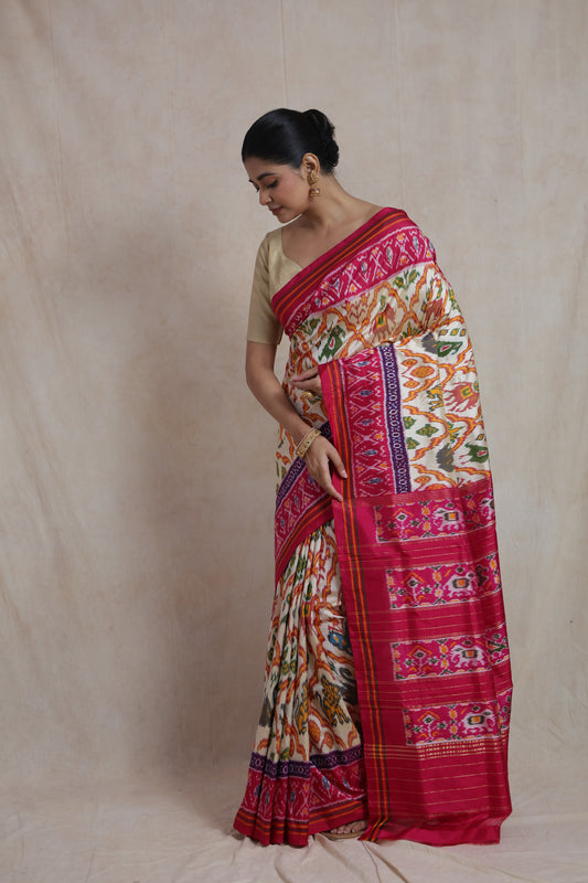 Elegant pallu display of ivory Pochampally silk saree with woven patterns