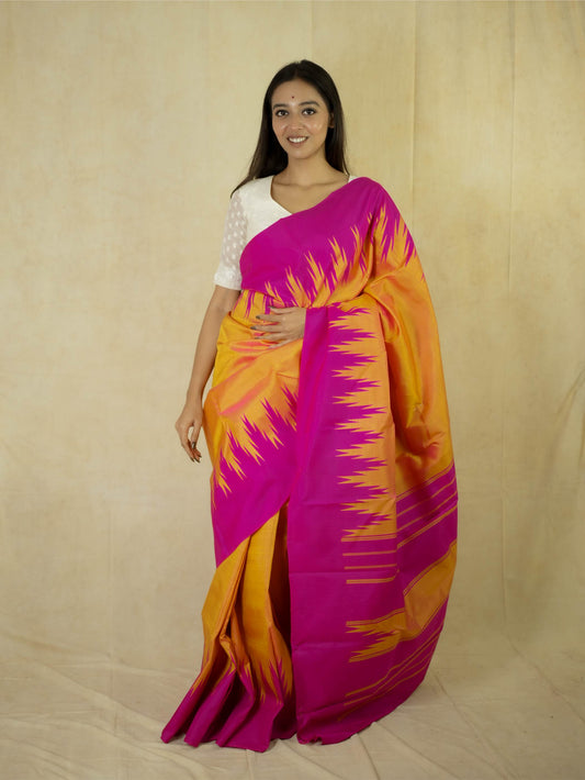 Handwoven dual-tone yellow and pink Kanjeevaram silk saree with 71 cm blouse piece from Joyee Kolkata, detailed fabric and rich texture.