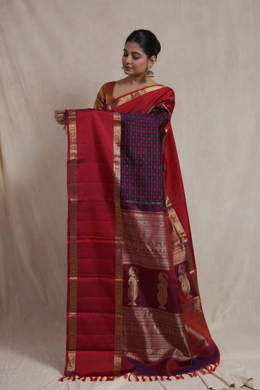 Full view of crimson Kanjivaram silk saree with rich zari woven pallu