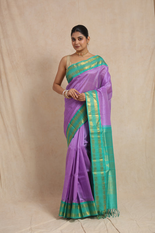 Full view of lavender Kanchipuram Sico saree with aqua green woven border