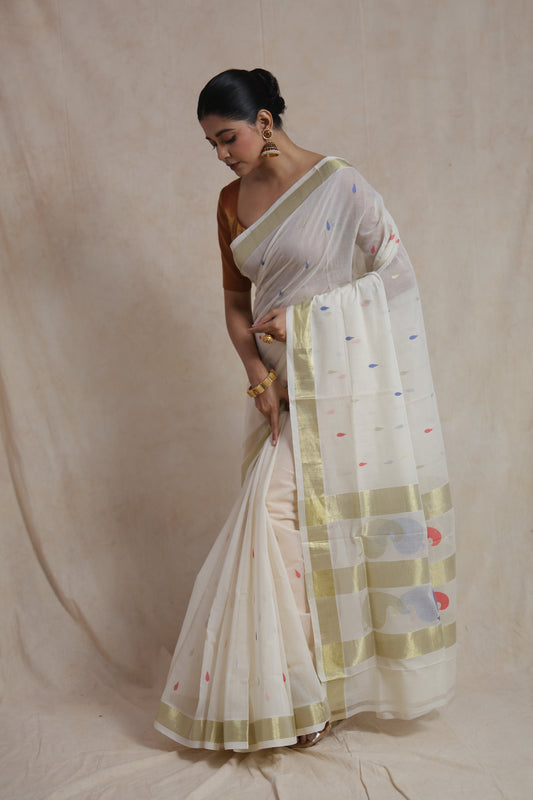 Elegant drape view of off white Kanchipuram cotton saree with zari border