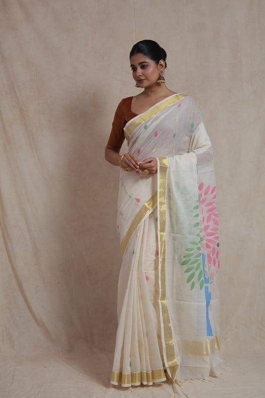Off white Kanchipuram cotton saree with colourful floral tree pallu