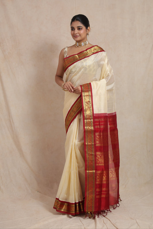 Full drape view of off-white Kanchipuram Sico saree with rich red woven pallu