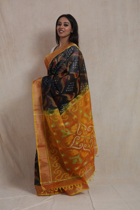 Side pose showcasing elegant woven pallu of black Panchampali SICO saree