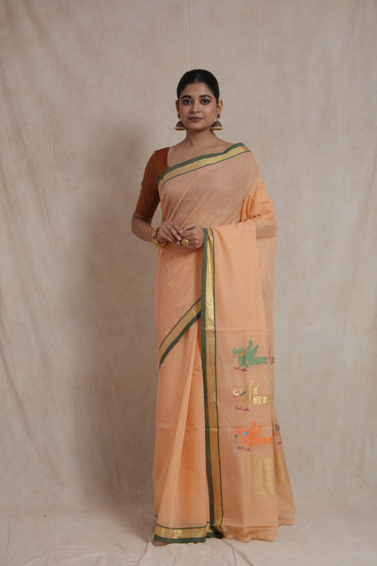 Front view of peach Kanchipuram cotton saree on model