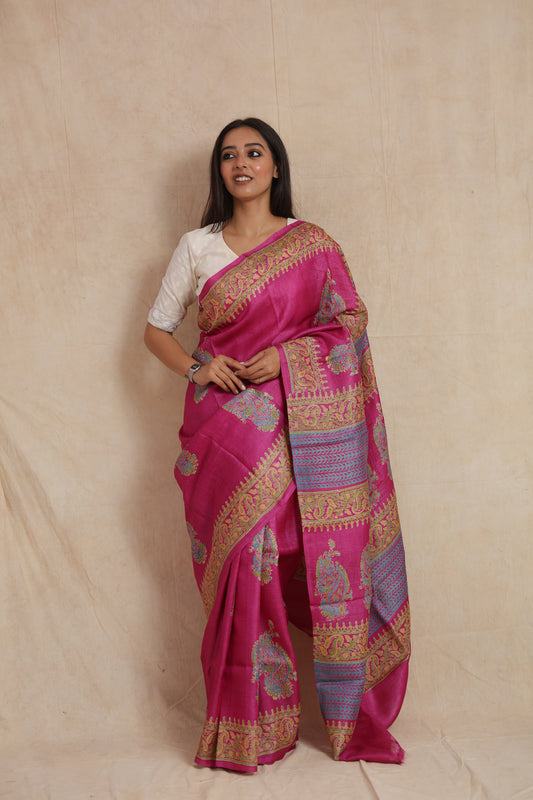 Front drape view of rani pink Tussar print saree with intricate paisley detailing