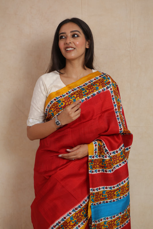 Close-up styling of red Garad silk saree