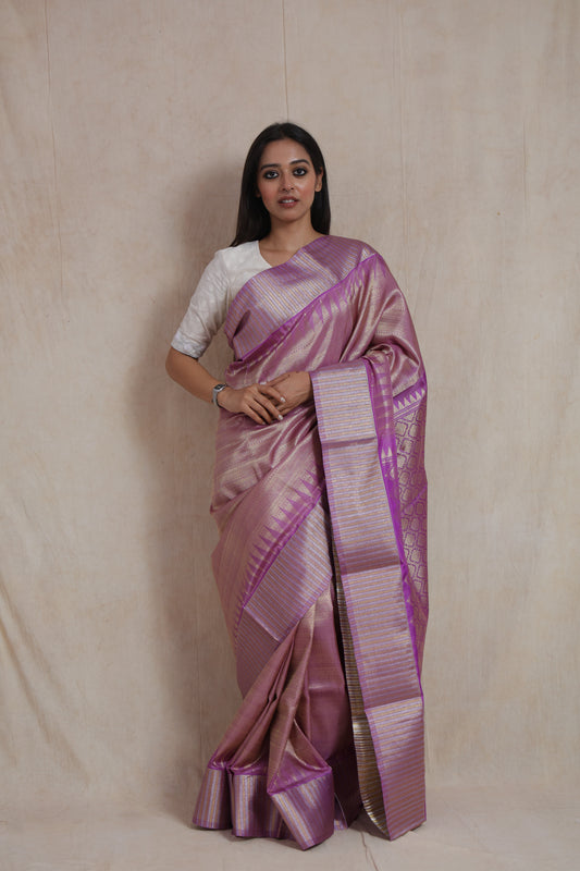 Detailed view of lavender Kanjivaram silk saree showcasing gold zari craftsmanship