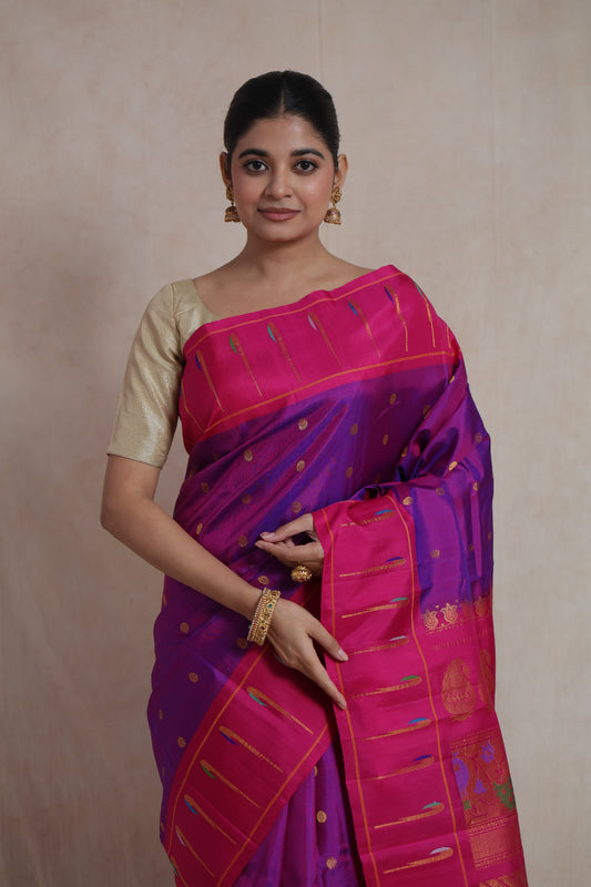 Portrait look of royal purple Gadwal Silk saree with vibrant pink border detailing