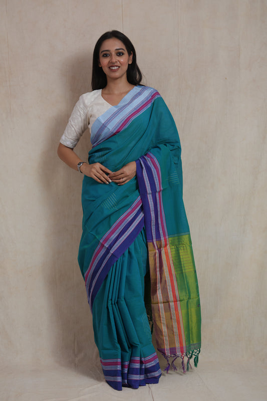 Full front view of traditional teal green Ilkal saree