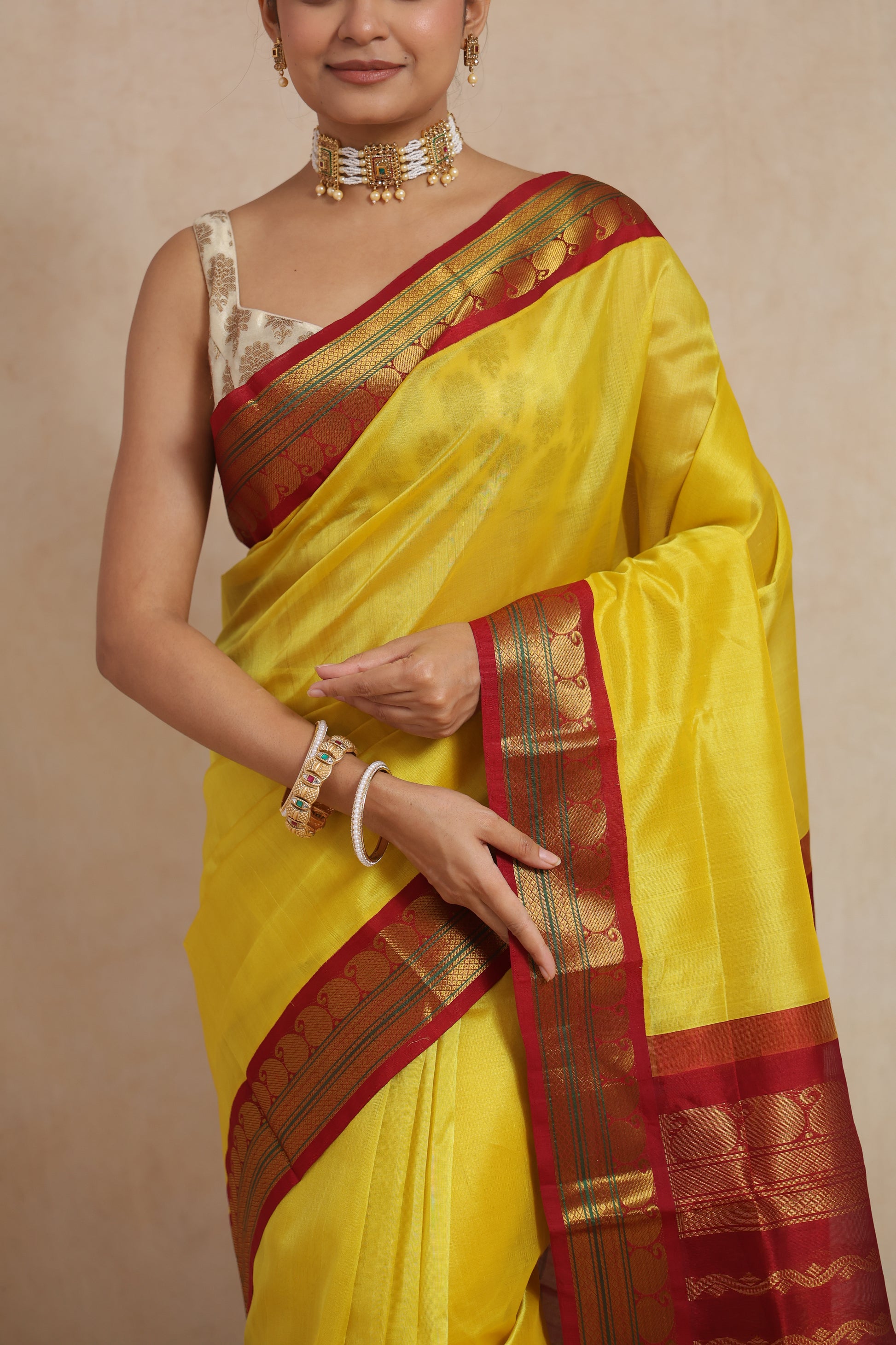 Front view of Sunshine Yellow Gadwal Silk Saree with maroon zari woven border