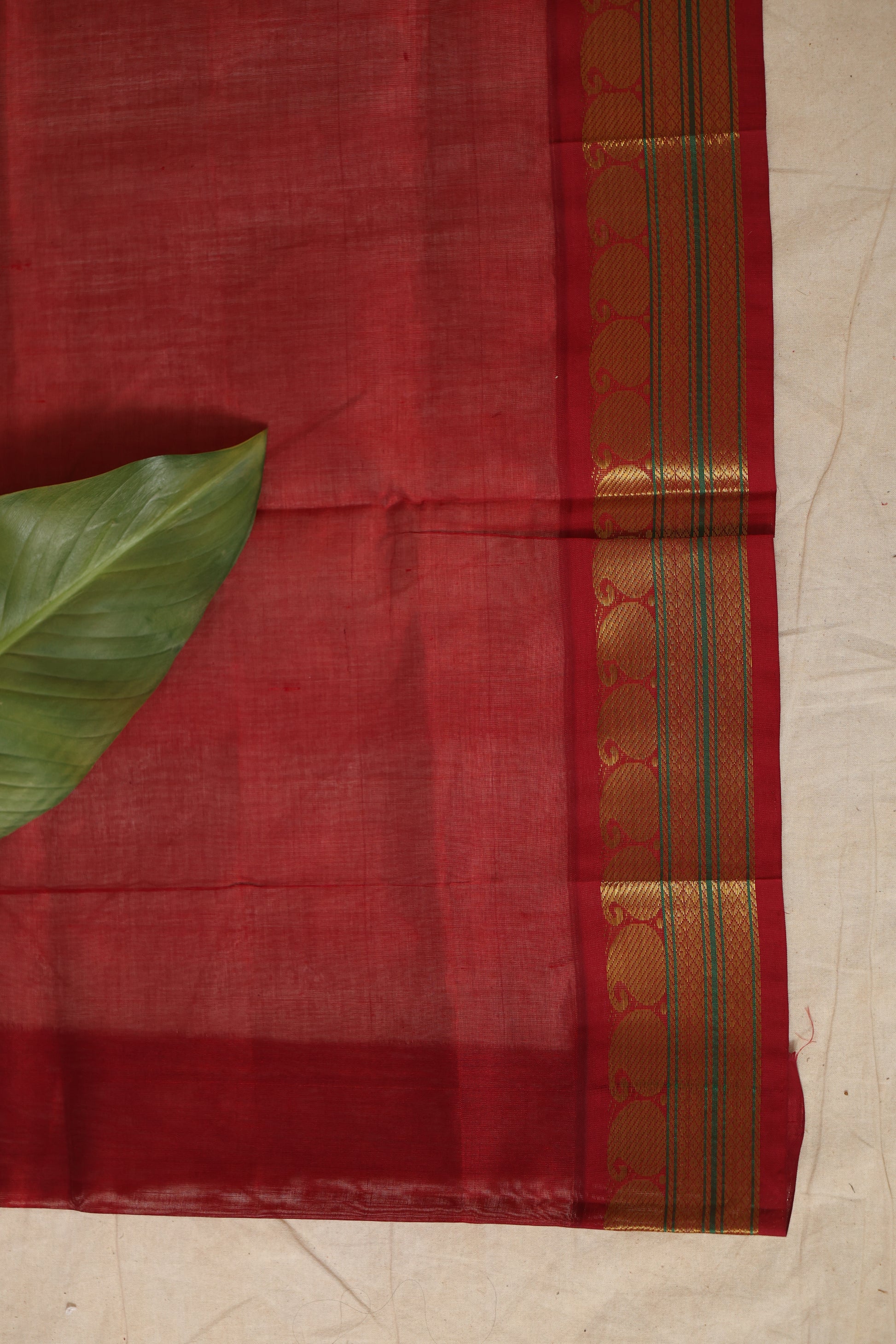 Detailed view of the richly woven maroon pallu of the Gadwal Silk Saree