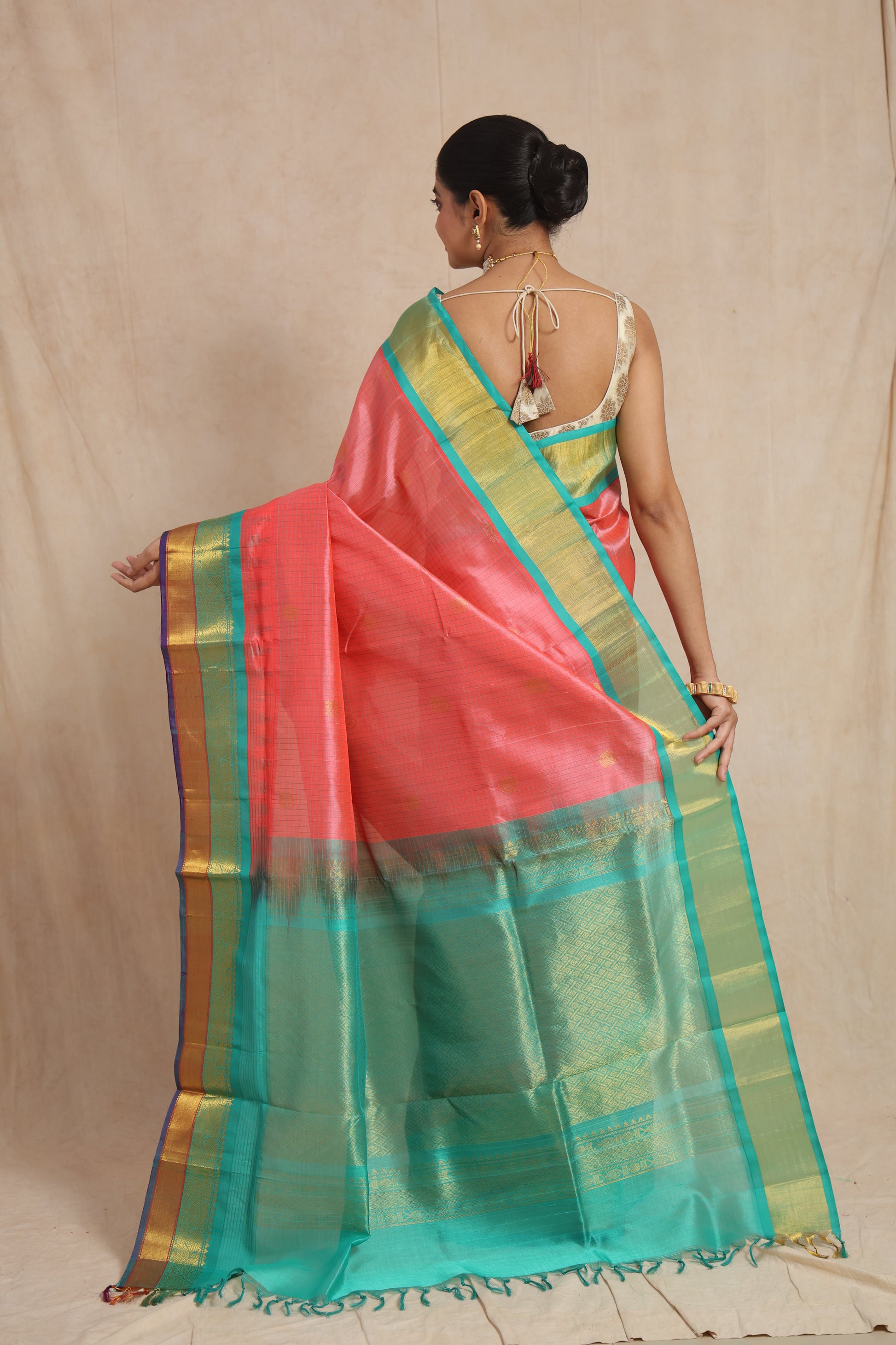 Back view showcasing the aqua green pallu and woven detailing of Kanchipuram SICO saree