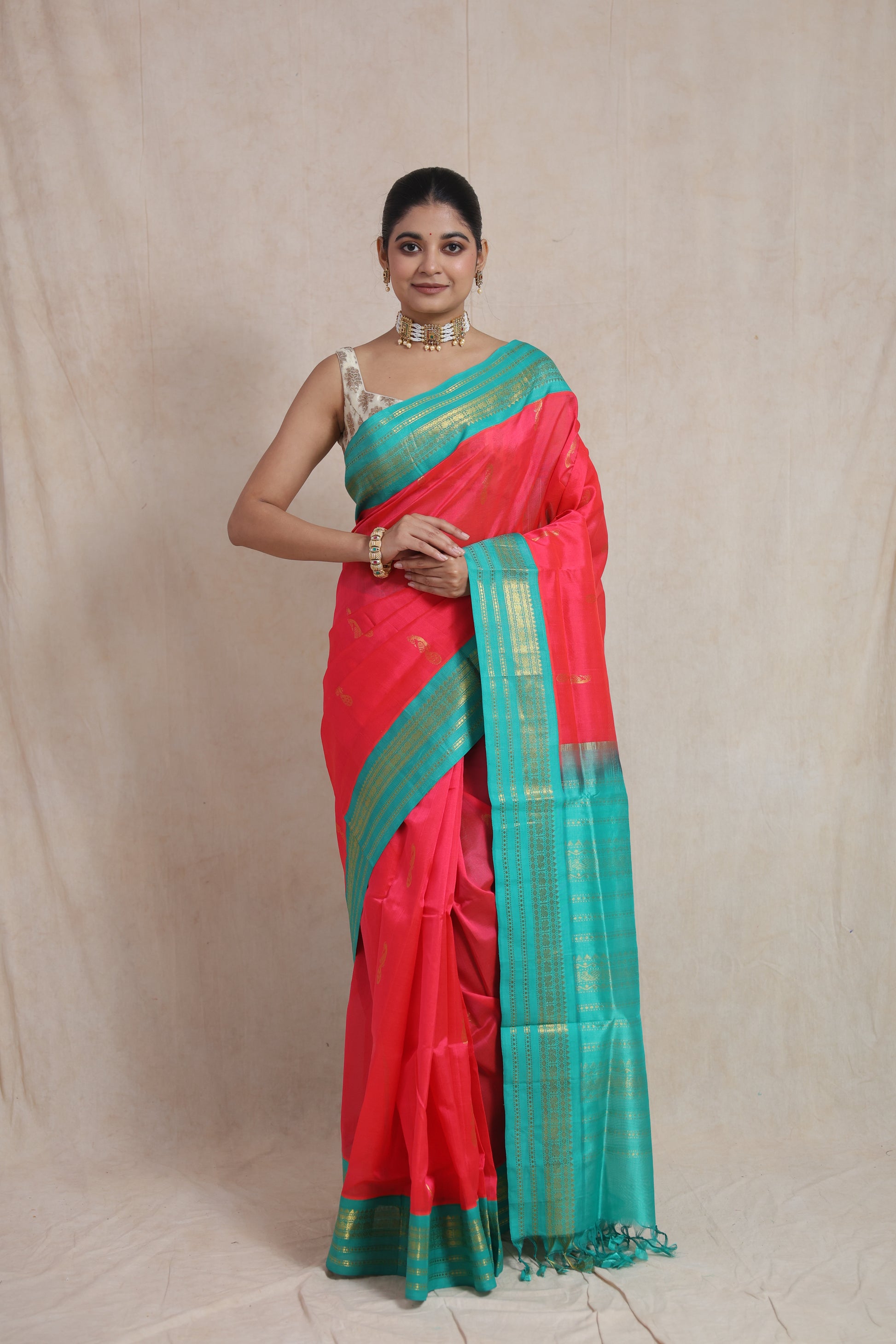 Front view of REDDISH Pink Kanchipuram Handloom SICO Saree with aqua blue border