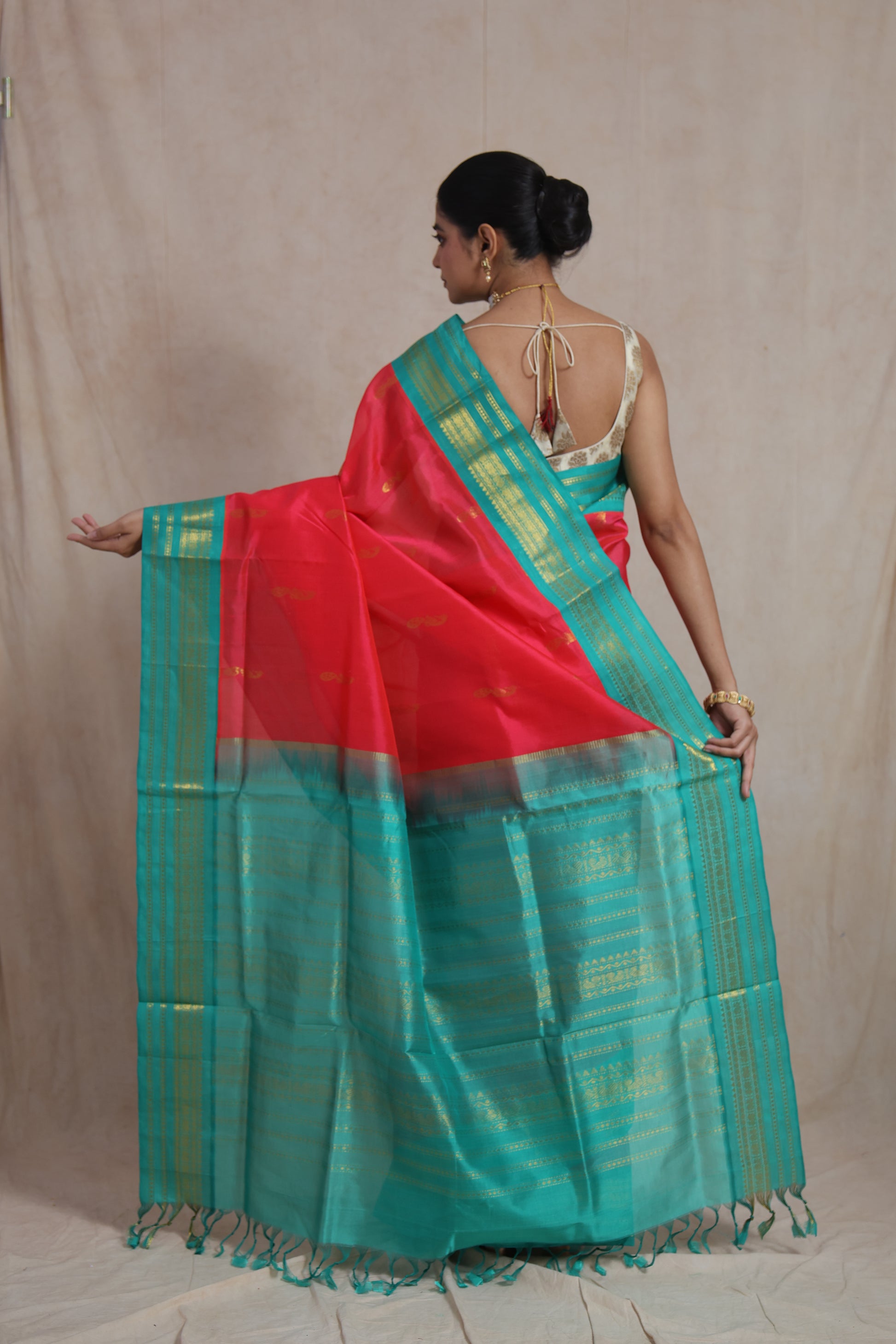Back view of REDDISH Pink Kanchipuram Handloom SICO Saree showcasing pallu