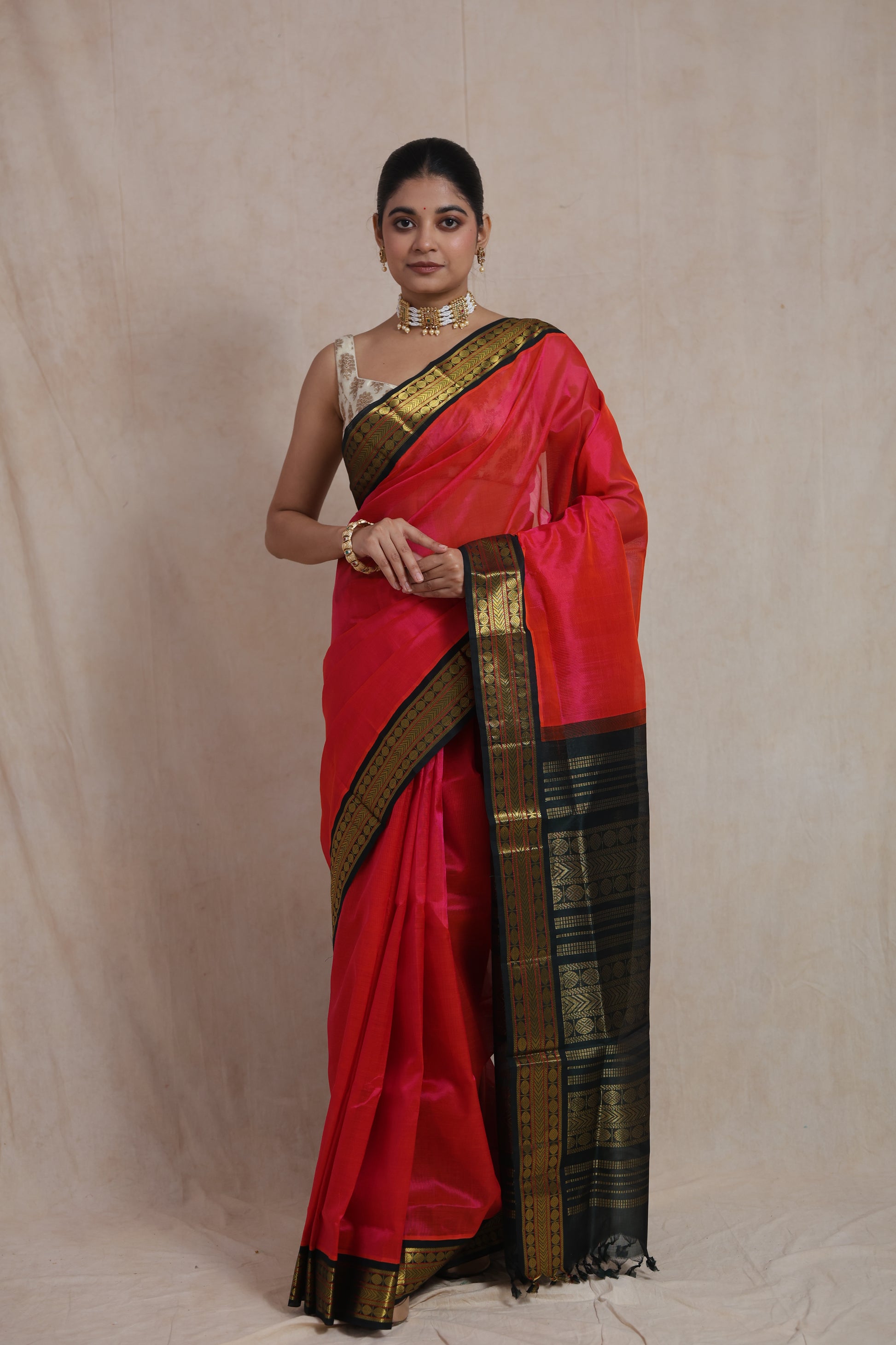 Full-length view of Ruby Pink Kanchipuram Handloom SICO Saree showcasing elegant drape