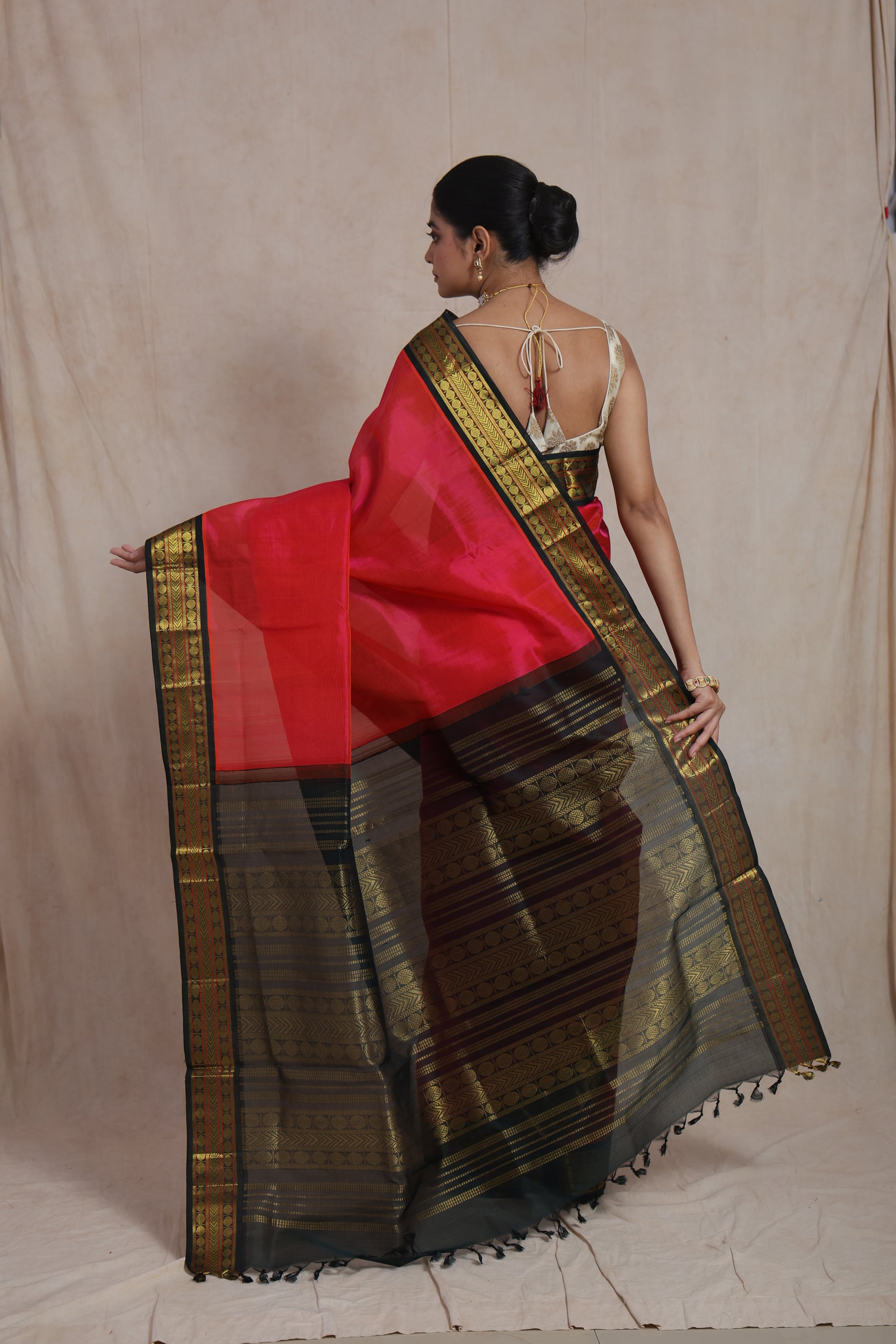 Back view of Pinkish Red Kanchipuram Handloom SICO Saree highlighting the woven pallu