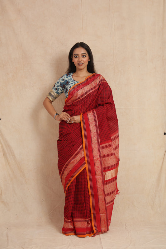 Pinkish Red Kanchipuram handloom cotton saree with coral pink pallu and woven motifs
