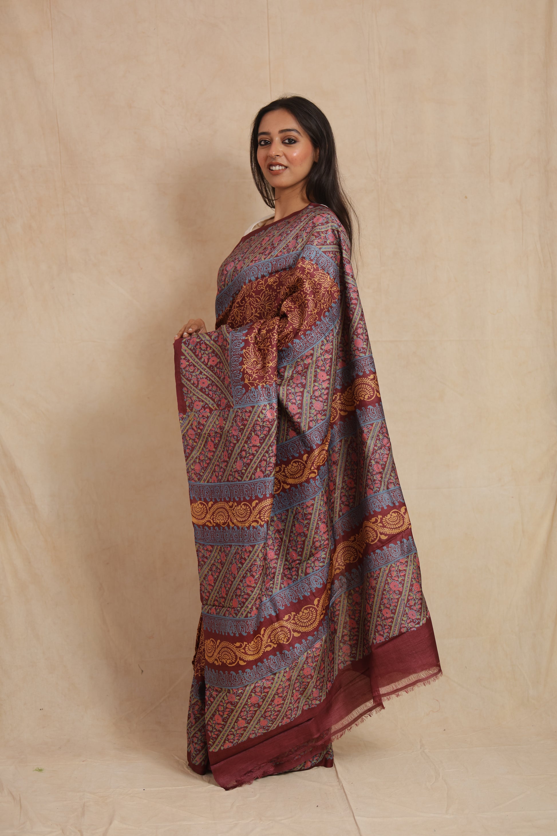 Side profile of printed Tussar silk saree featuring intricate floral patterns