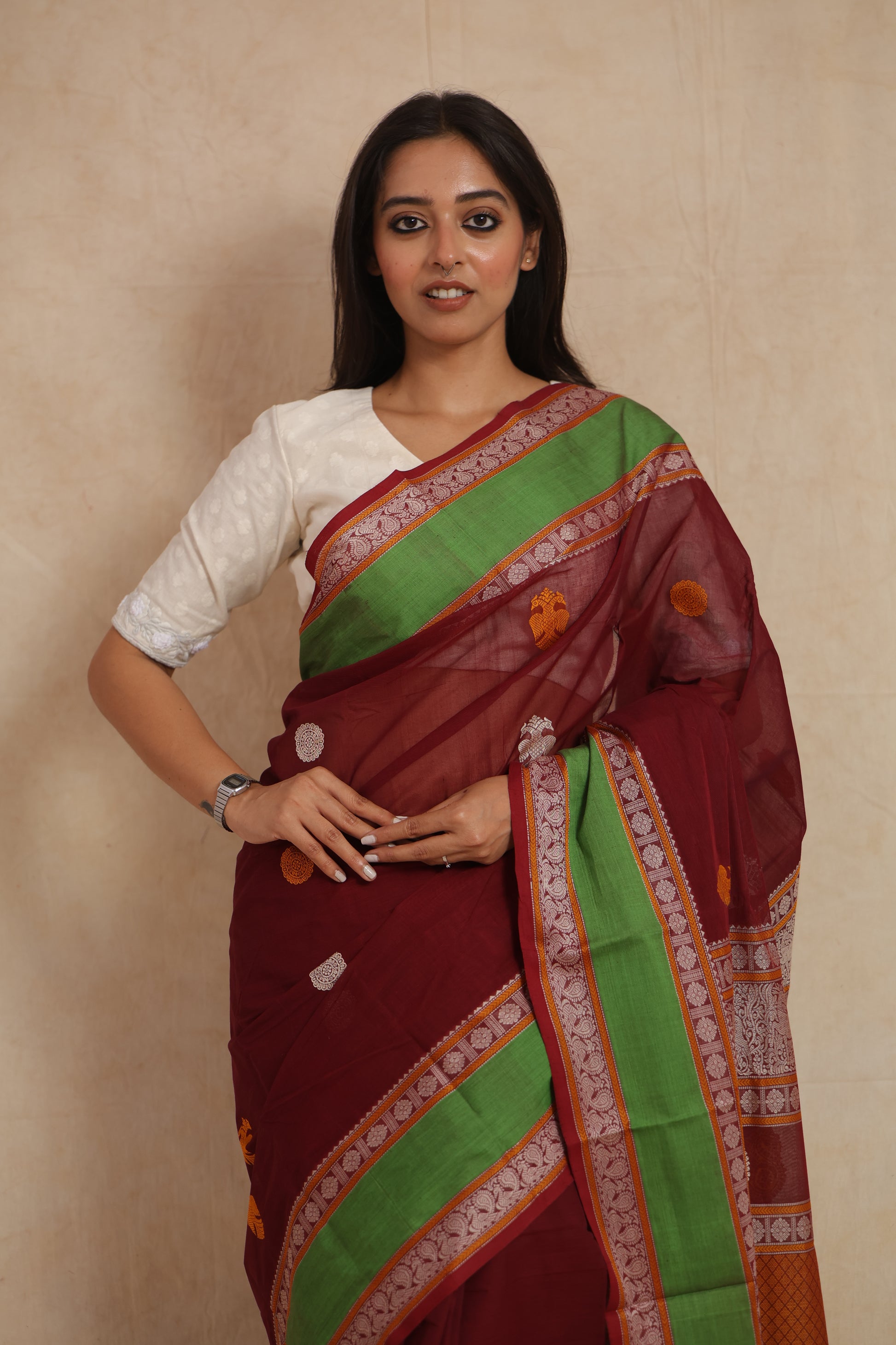 Portrait view of maroon Kanchipuram cotton saree featuring traditional handloom craftsmanship