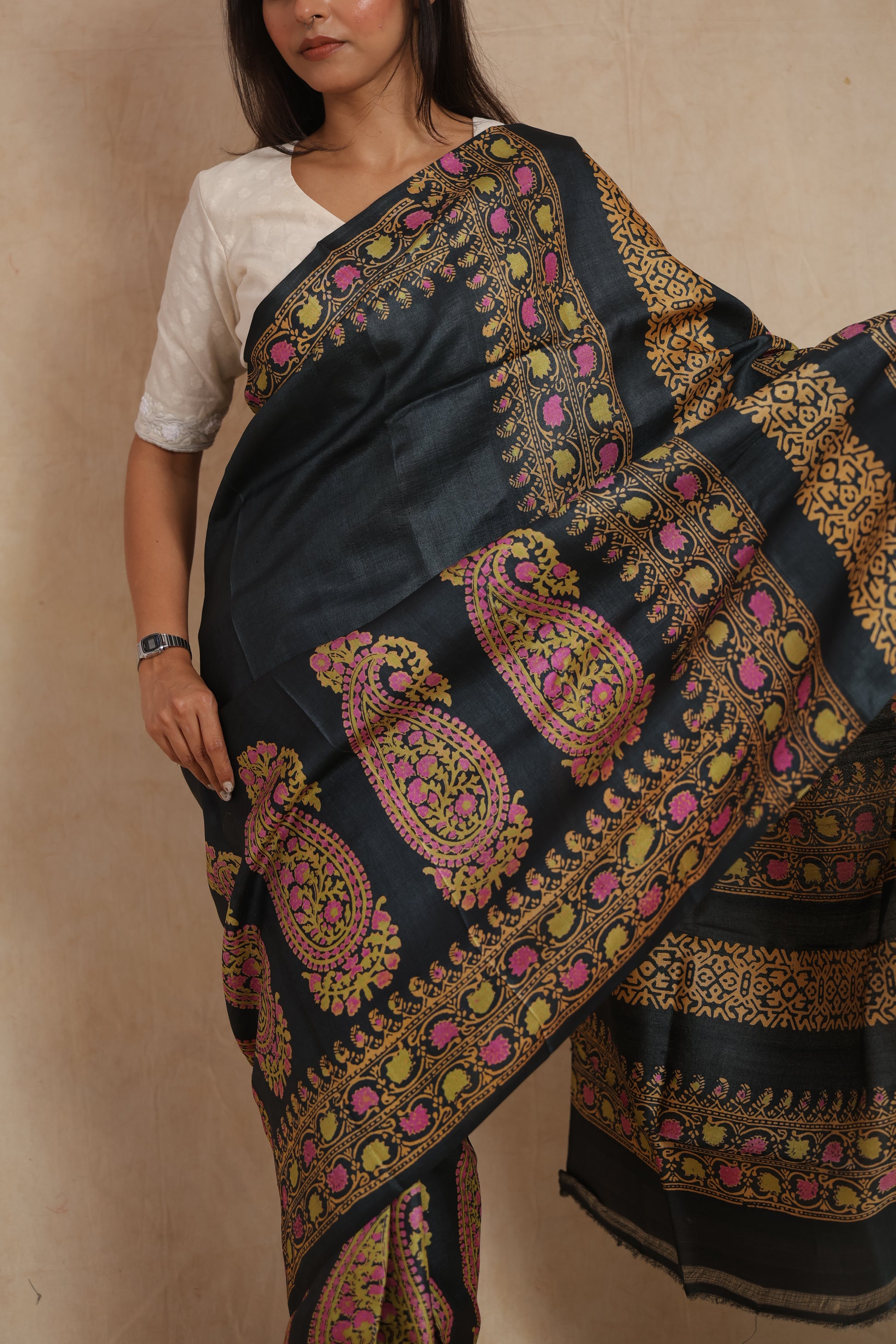 Detailed view of paisley motifs and heritage-inspired border on printed Tussar silk saree
