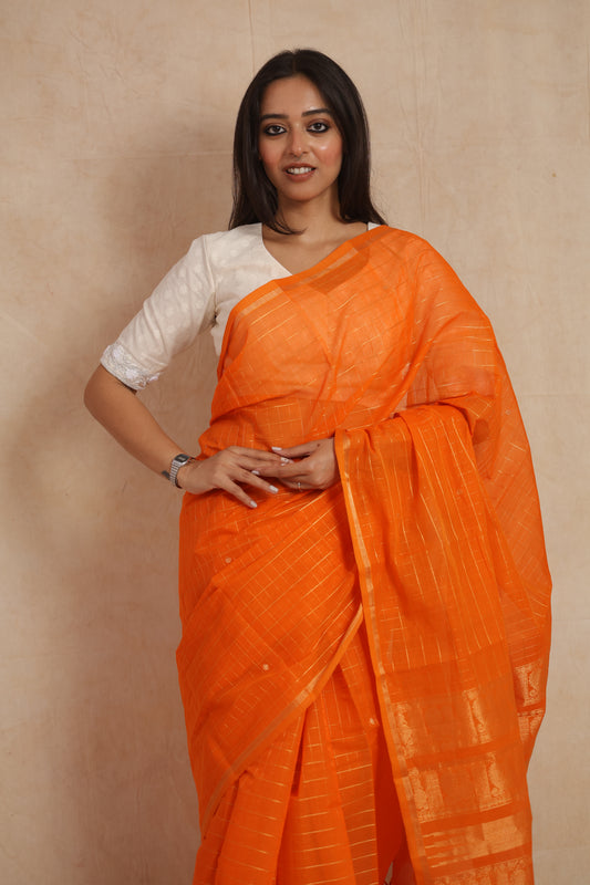 Front view of vibrant orange Kanchipuram handloom cotton saree