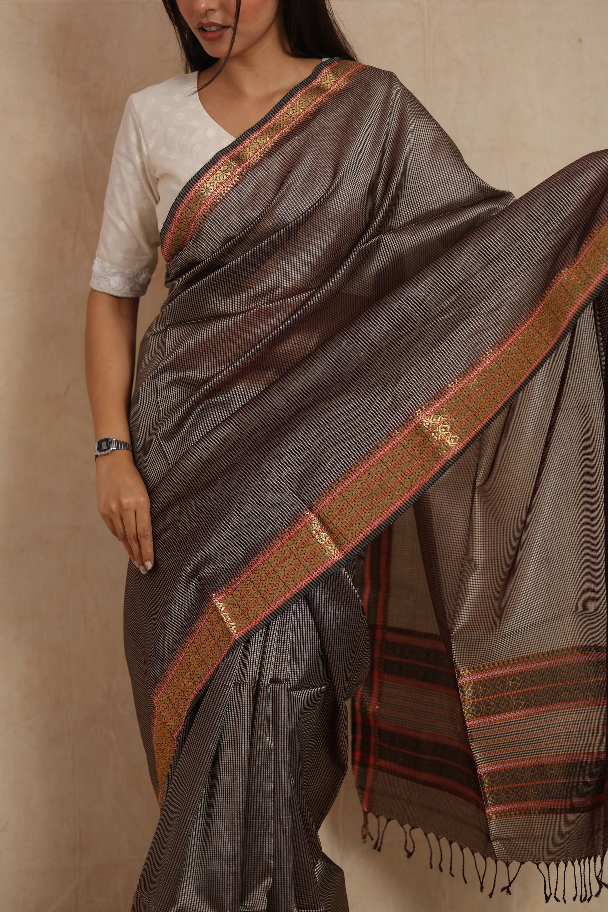 Close-up of Maheshwari silk cotton saree with intricate woven border detailing