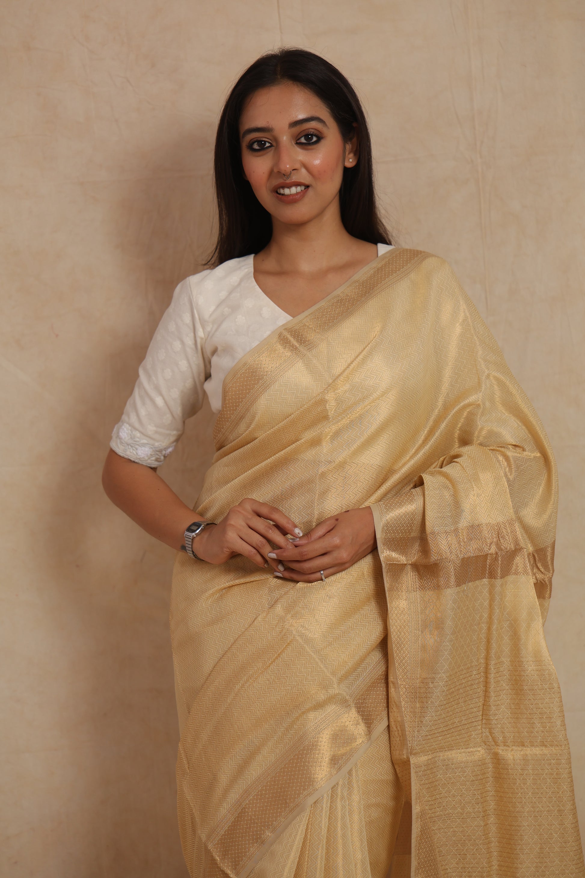 Front drape view of golden beige Maheshwari silk cotton saree with soft sheen