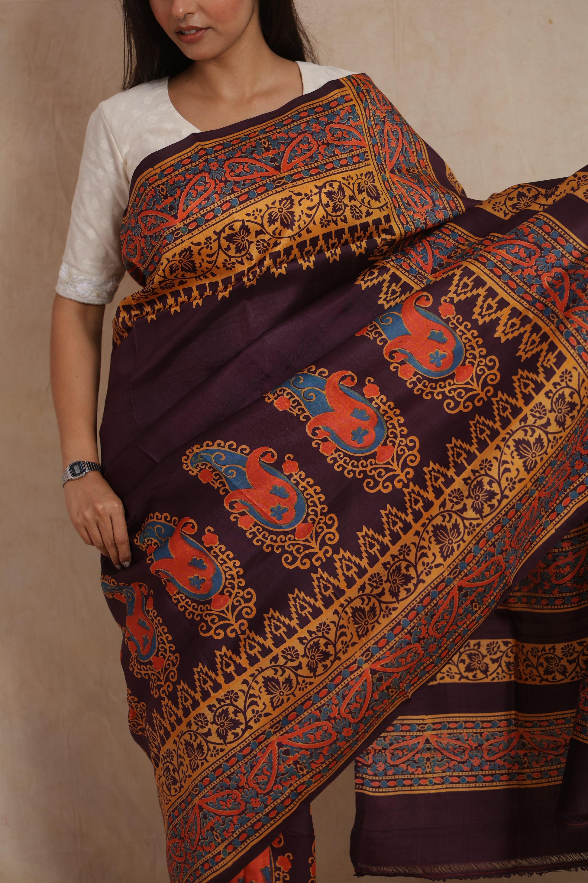 Close-up of multicolor paisley border and intricate Batik design on silk saree