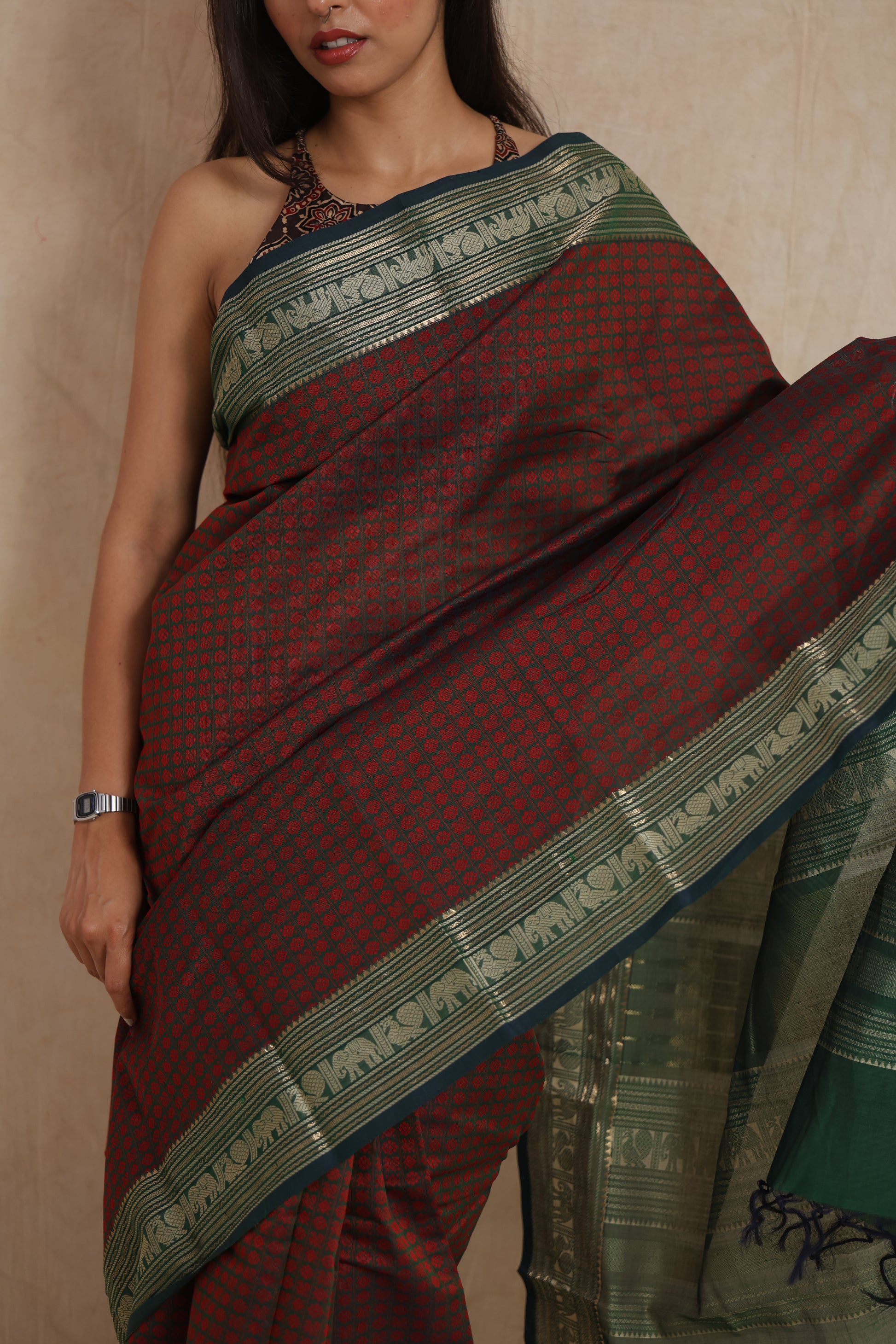 Traditional Kanchipuram cotton saree with detailed woven pallu and contrast border