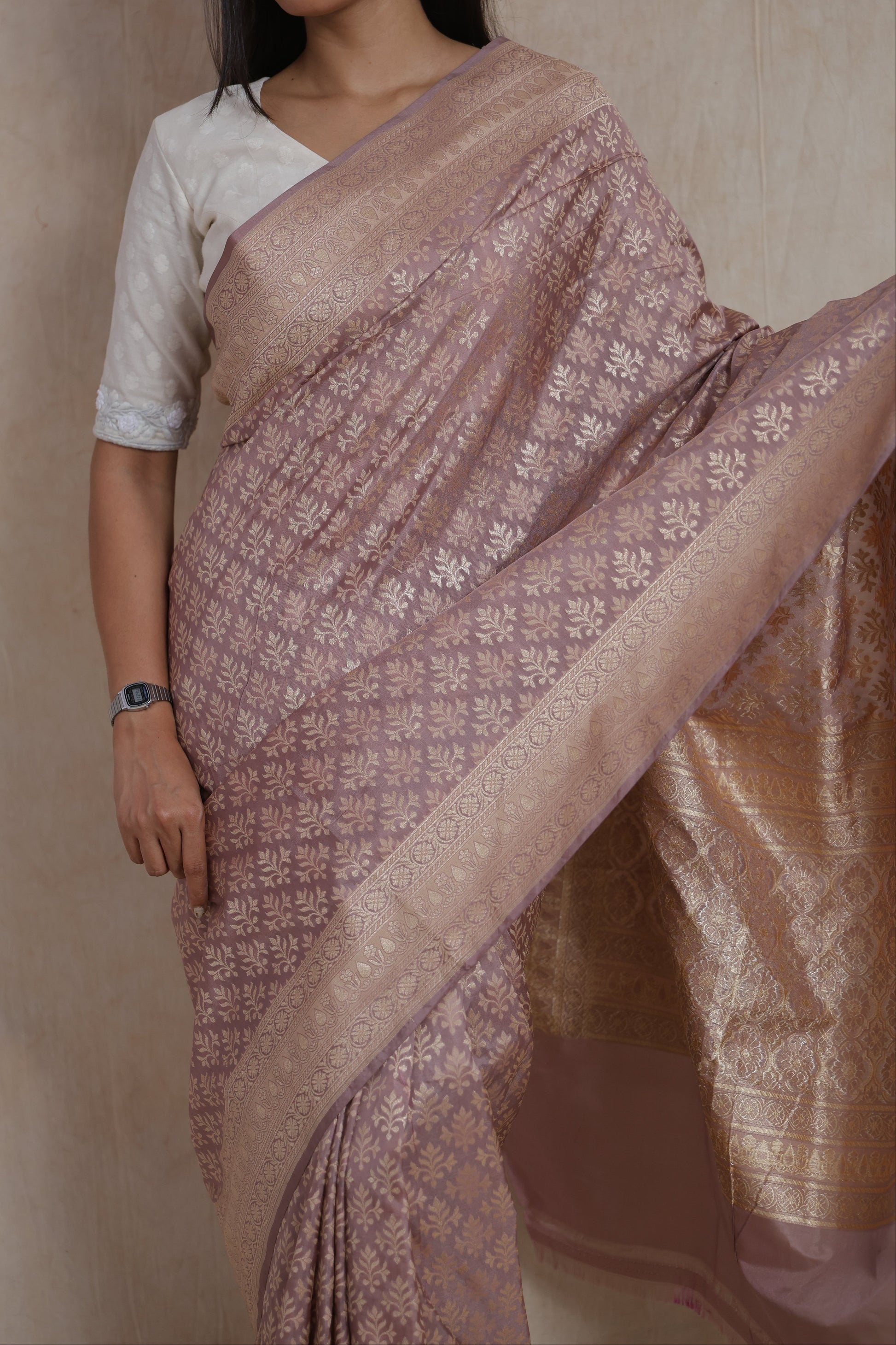 Portrait view of dusty rose Banarasi art silk saree featuring elegant floral weaving and rich craftsmanship