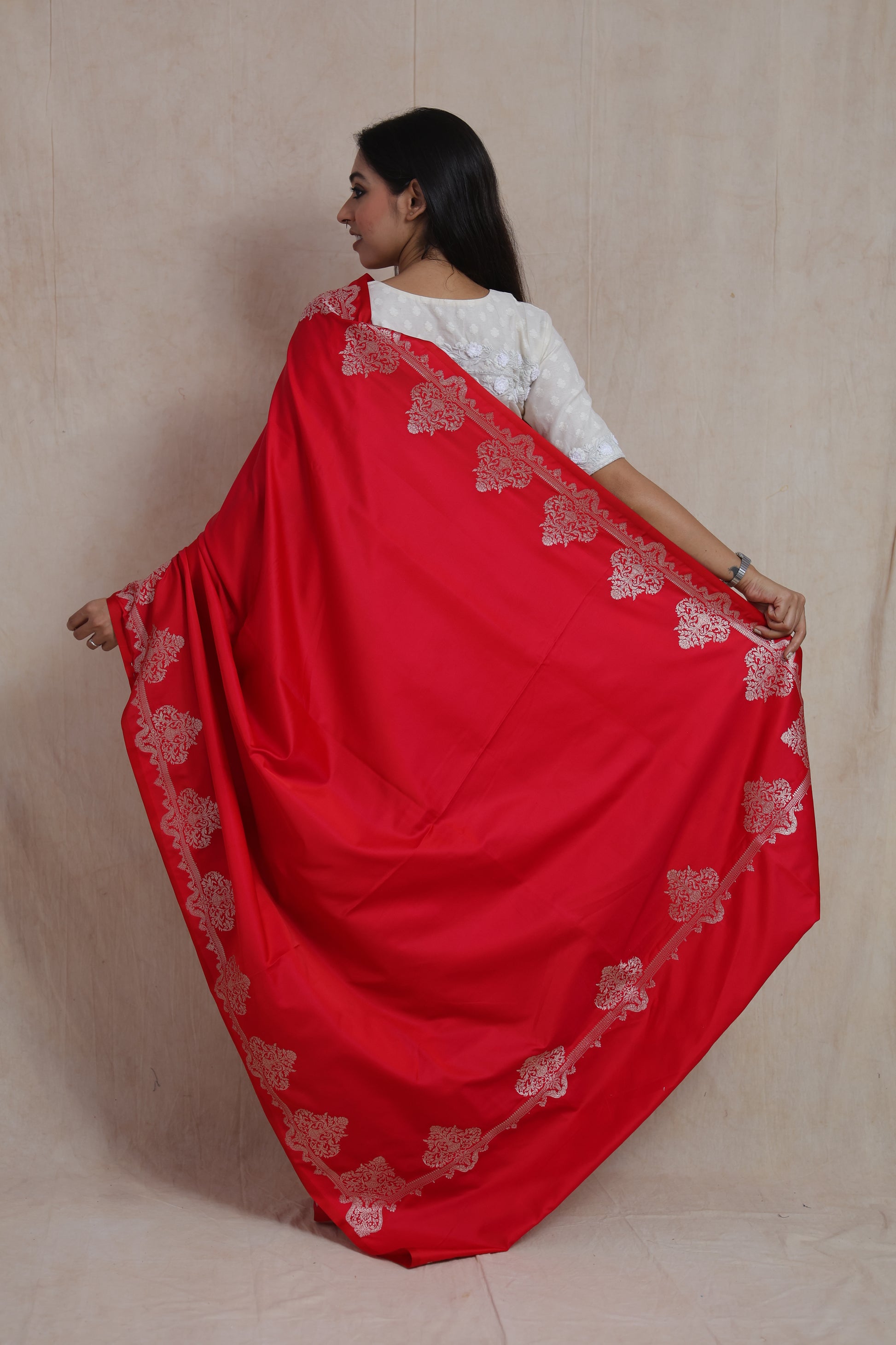 Back view of crimson red Banarasi art silk saree showcasing the graceful pallu