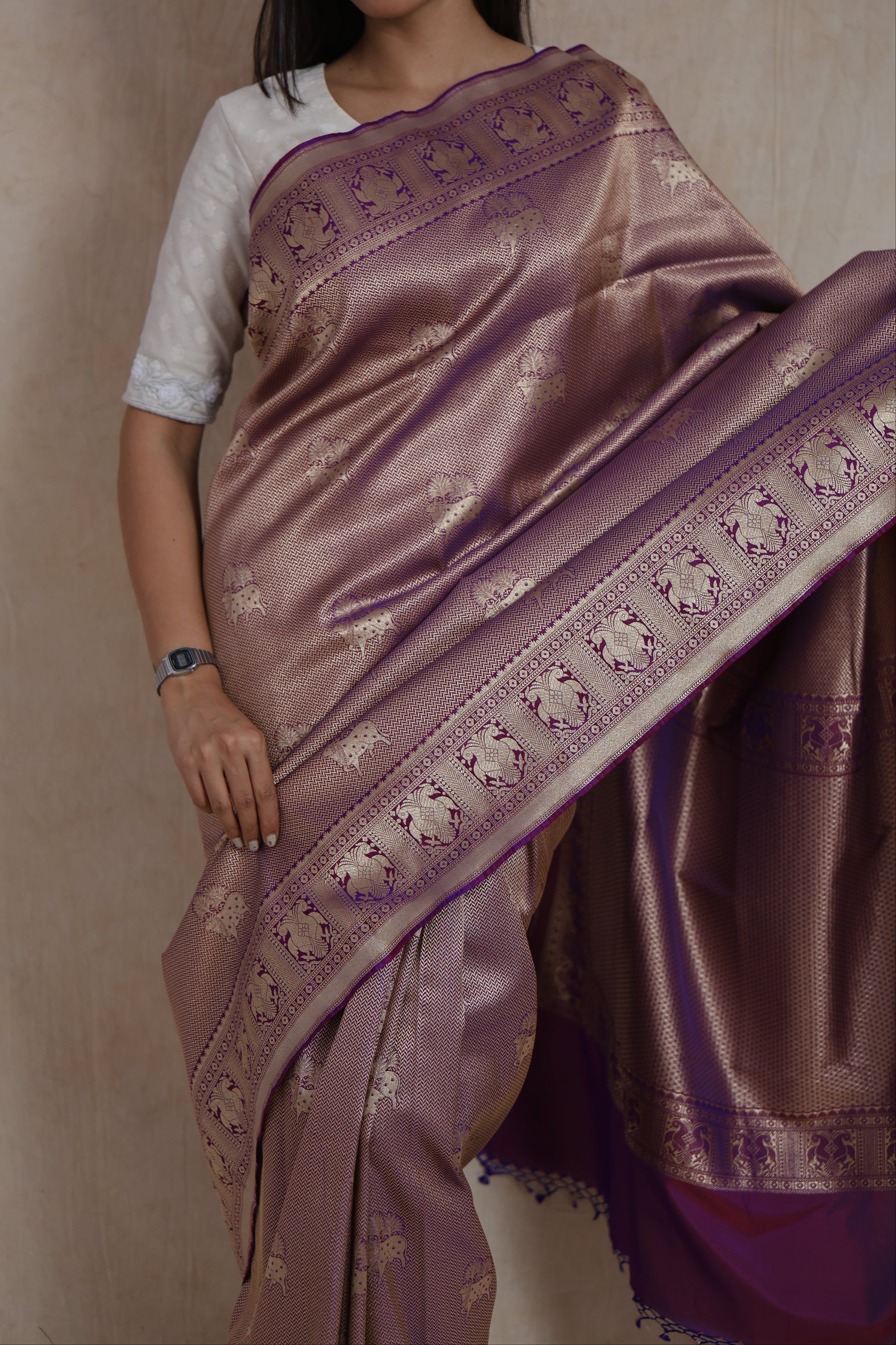 Detailed view of mauve Banarasi silk saree with elephant motifs and luxurious woven craftsmanship