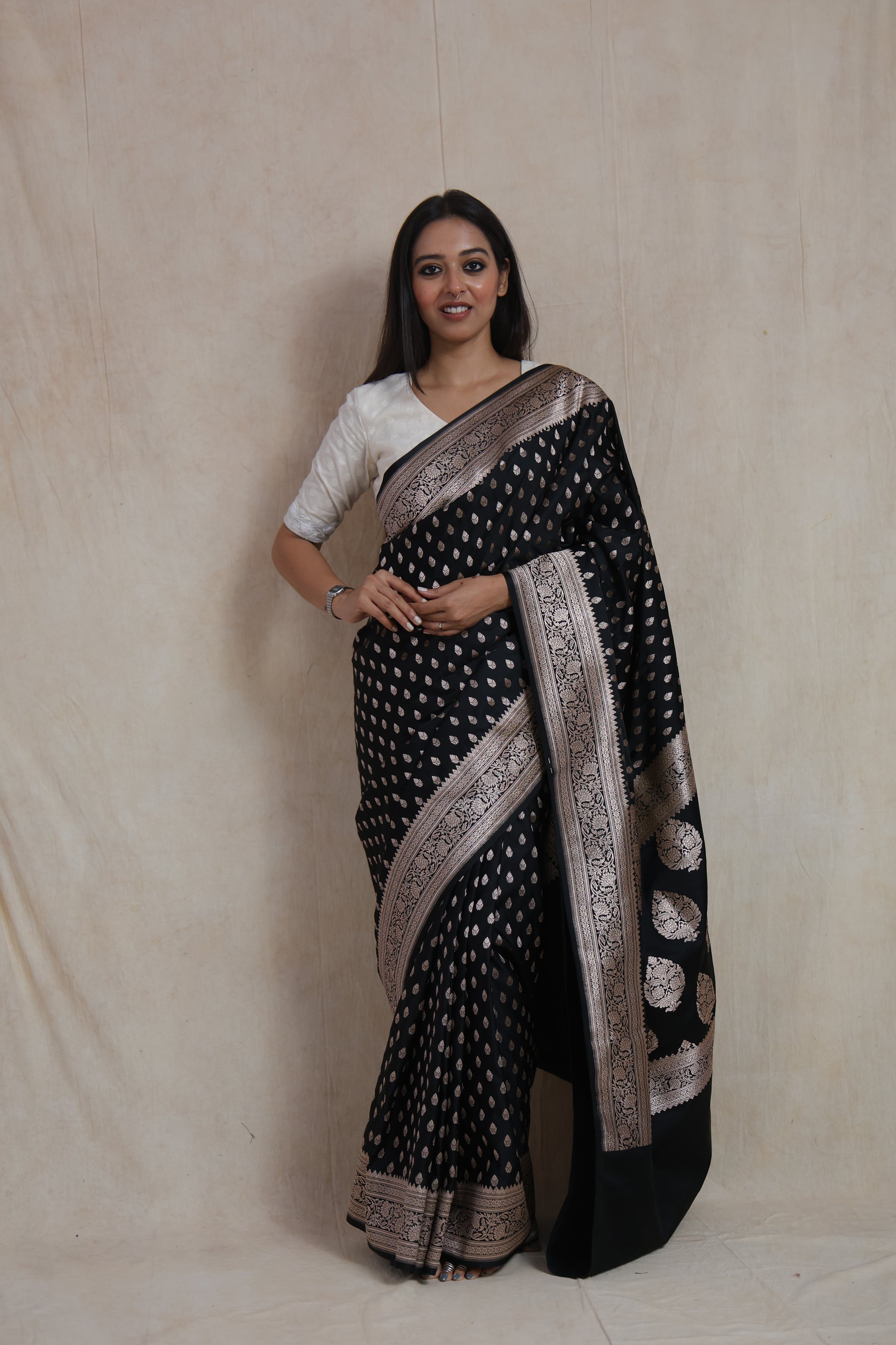 front Banarasi art silk saree with silver woven buttas and intricate floral border
