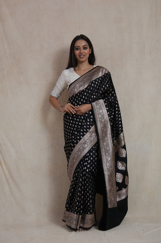 front Banarasi art silk saree with silver woven buttas and intricate floral border